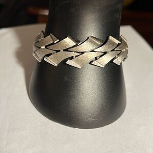 Trifari 7.5” brushed faux silver ladies bracelet.